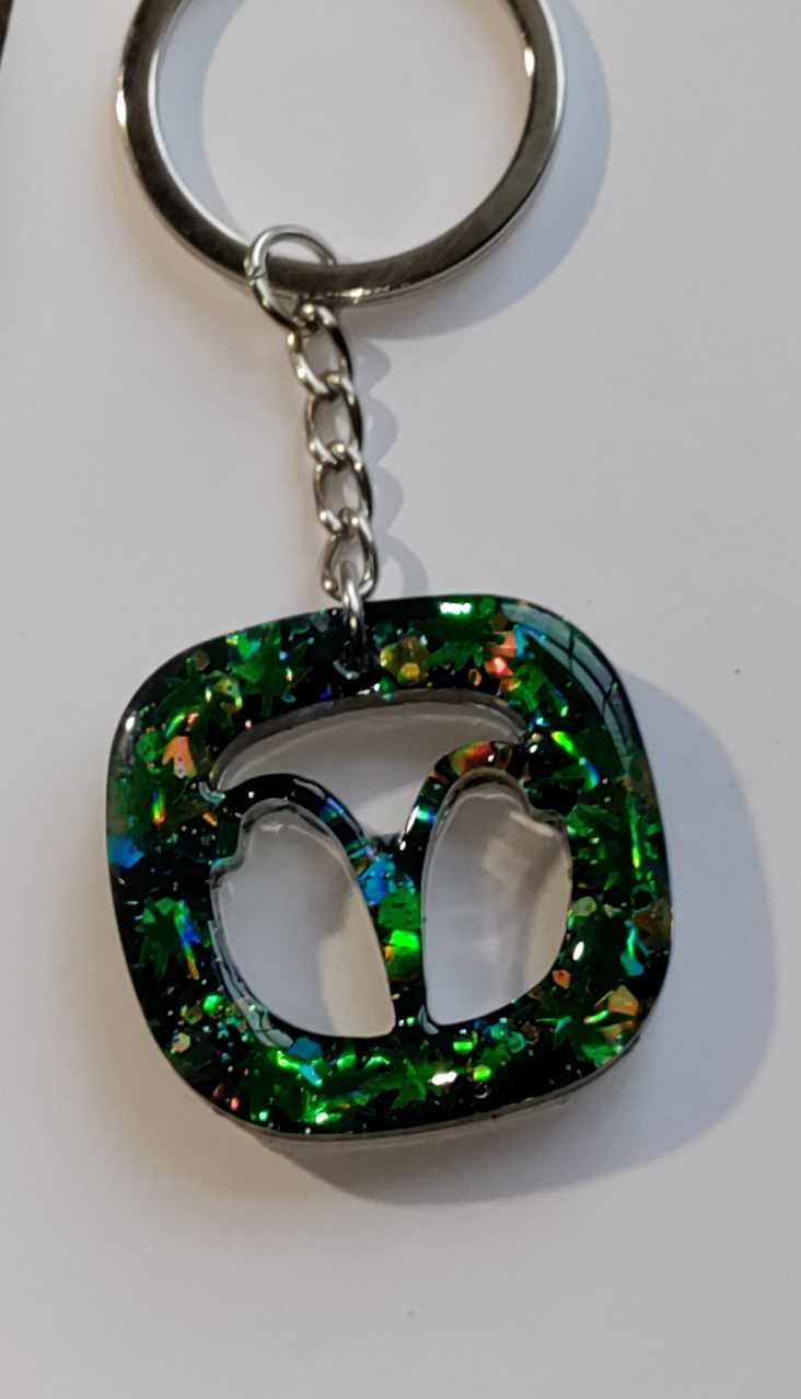 Cannabis Inspired Horoscope Keychains earrings from Karma Goodness Designs