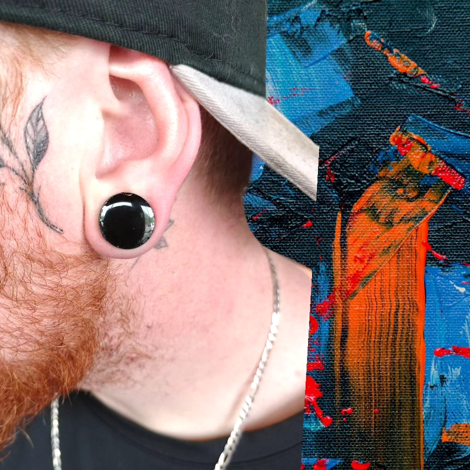 Color Changing Black Resin ear plugs  from Karma Goodness Designs